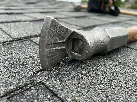 Professional roofer performing precise roof repair